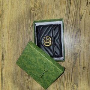 Gucci Black Wallet with Gold Logo